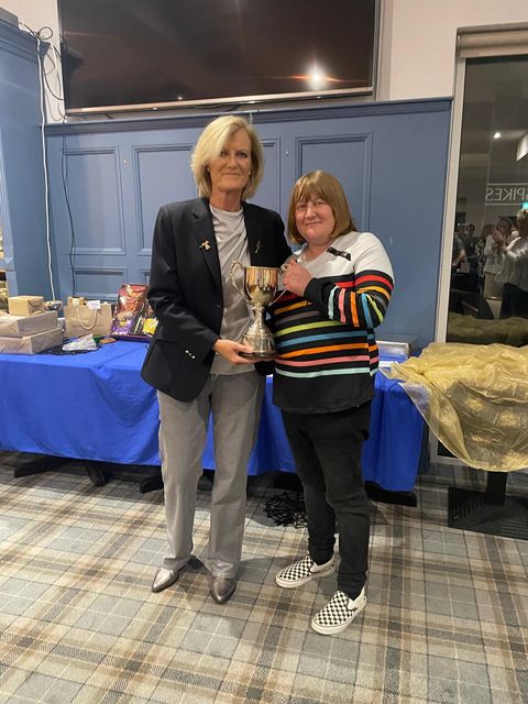 Tara Dunne, Rosslare Golfer of the Year, receiving her trophy from Karen Burke (Captain).
